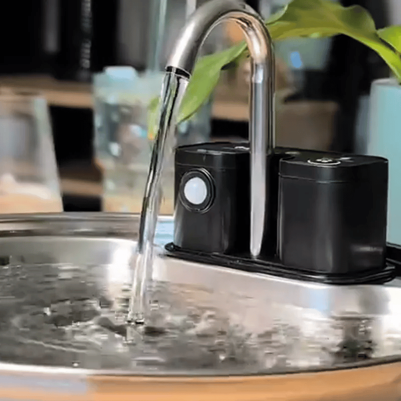 Close-up of the tap-style water flow on the stainless fountain