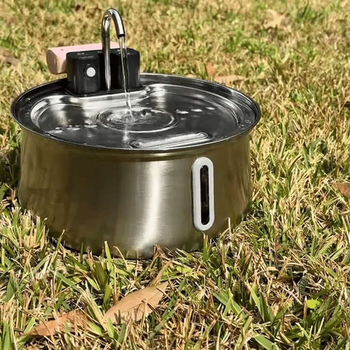 Wireless fountain running on the grass, no cable